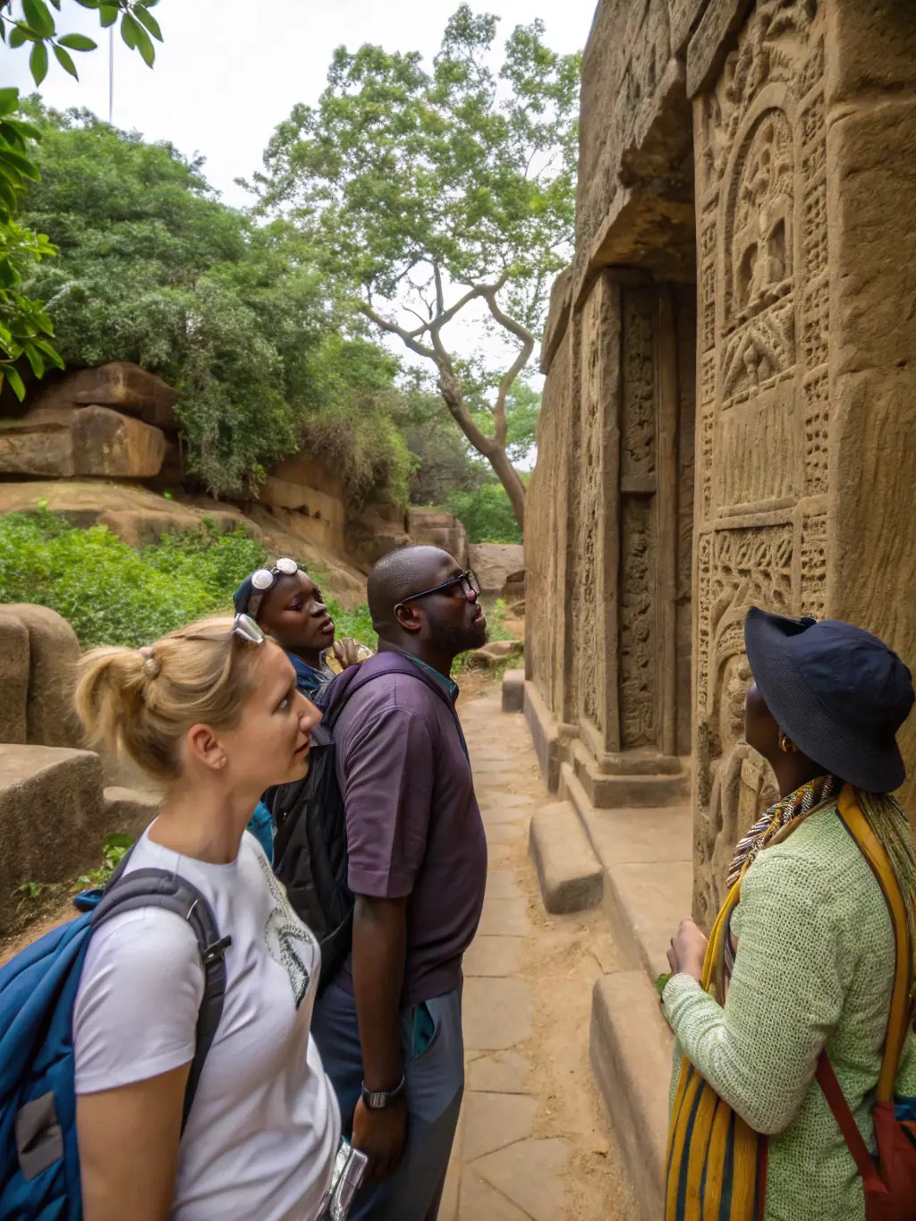 A photograph of a guided tour at an archaeological site in Gueret, with a knowledgeable guide explaining the historical significance to visitors.